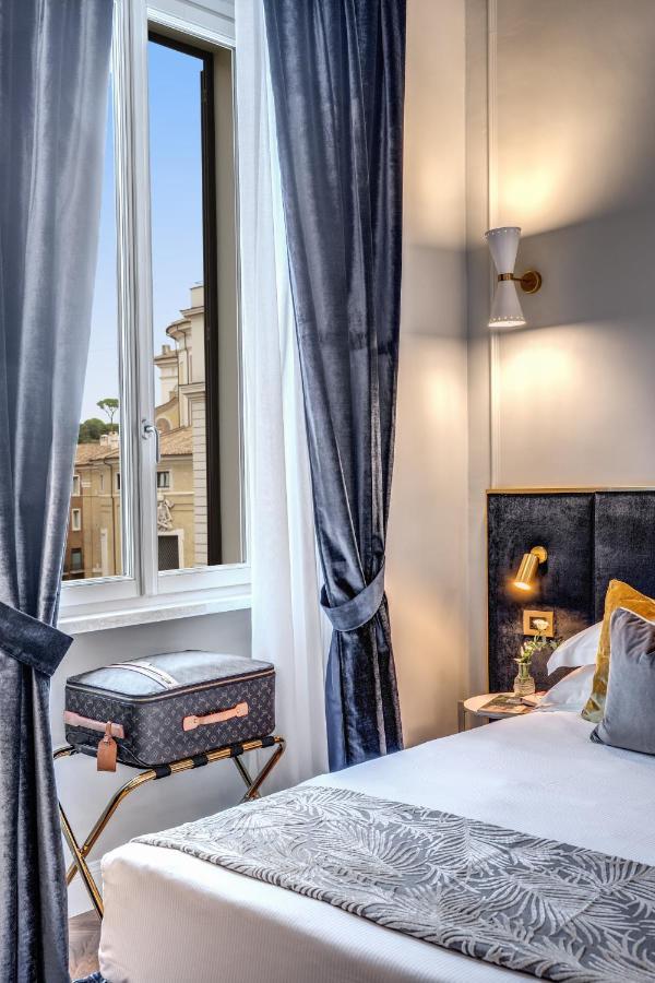 Tree Charme Augusto Luxury Suites โรม ภายนอก รูปภาพ