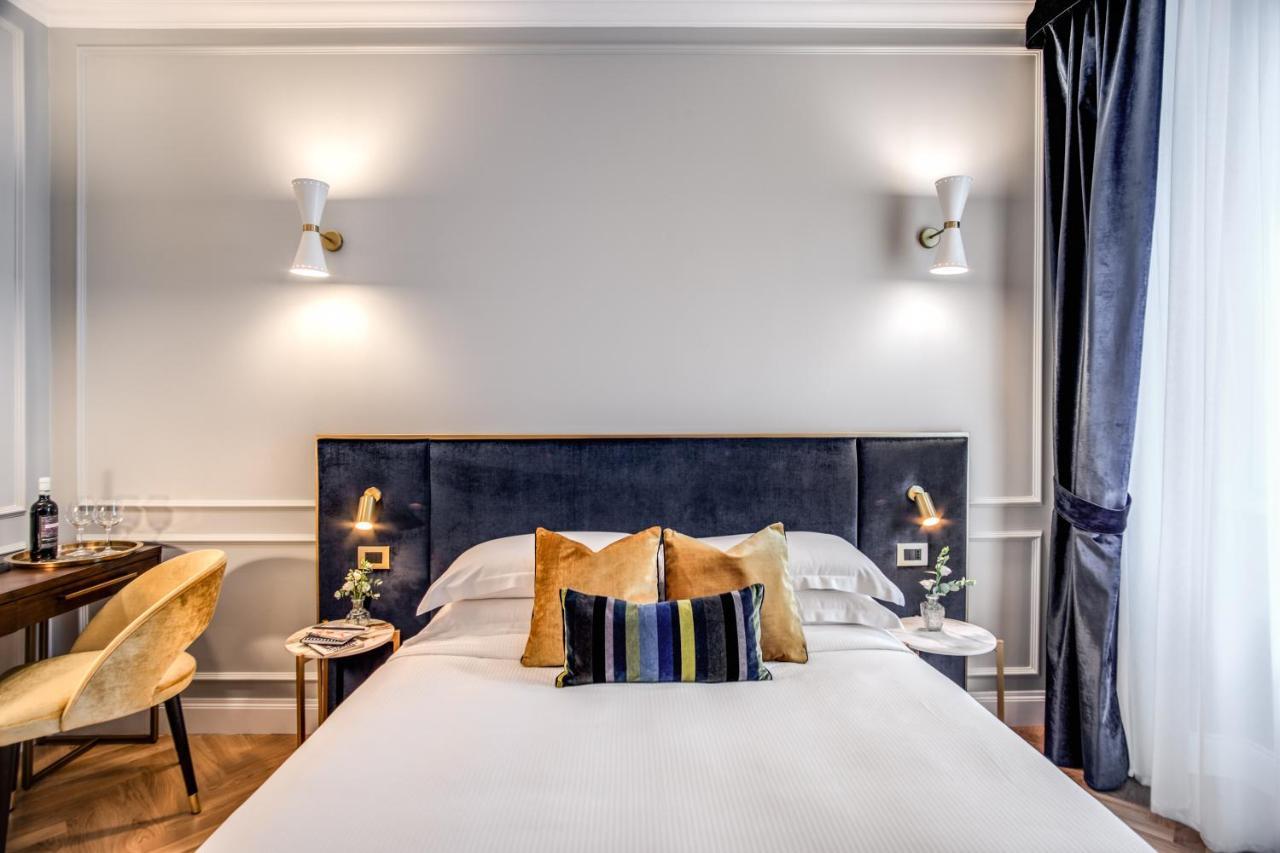 Tree Charme Augusto Luxury Suites โรม ภายนอก รูปภาพ