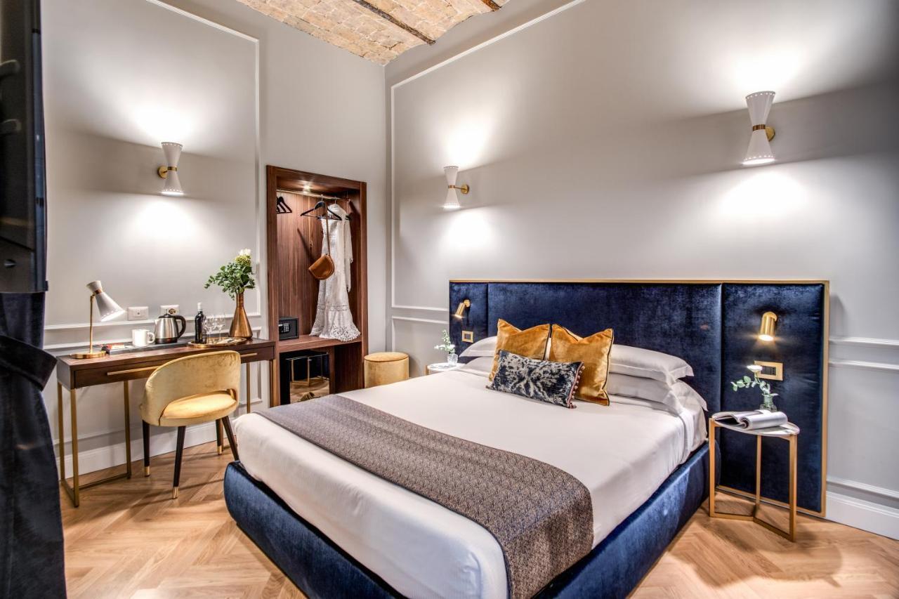 Tree Charme Augusto Luxury Suites โรม ภายนอก รูปภาพ