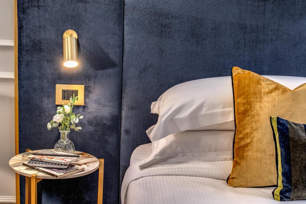 Tree Charme Augusto Luxury Suites โรม ภายนอก รูปภาพ