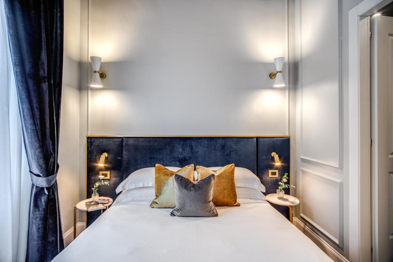Tree Charme Augusto Luxury Suites โรม ภายนอก รูปภาพ