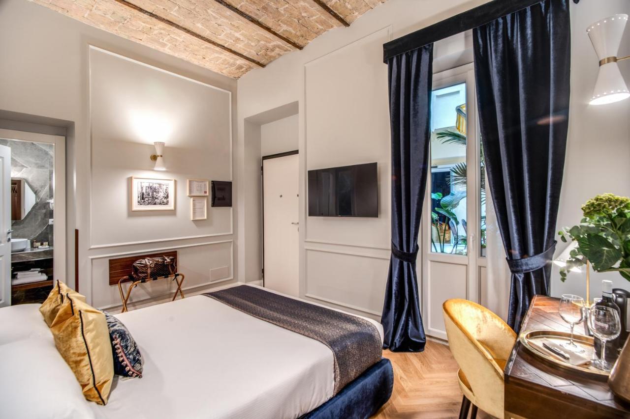 Tree Charme Augusto Luxury Suites โรม ภายนอก รูปภาพ