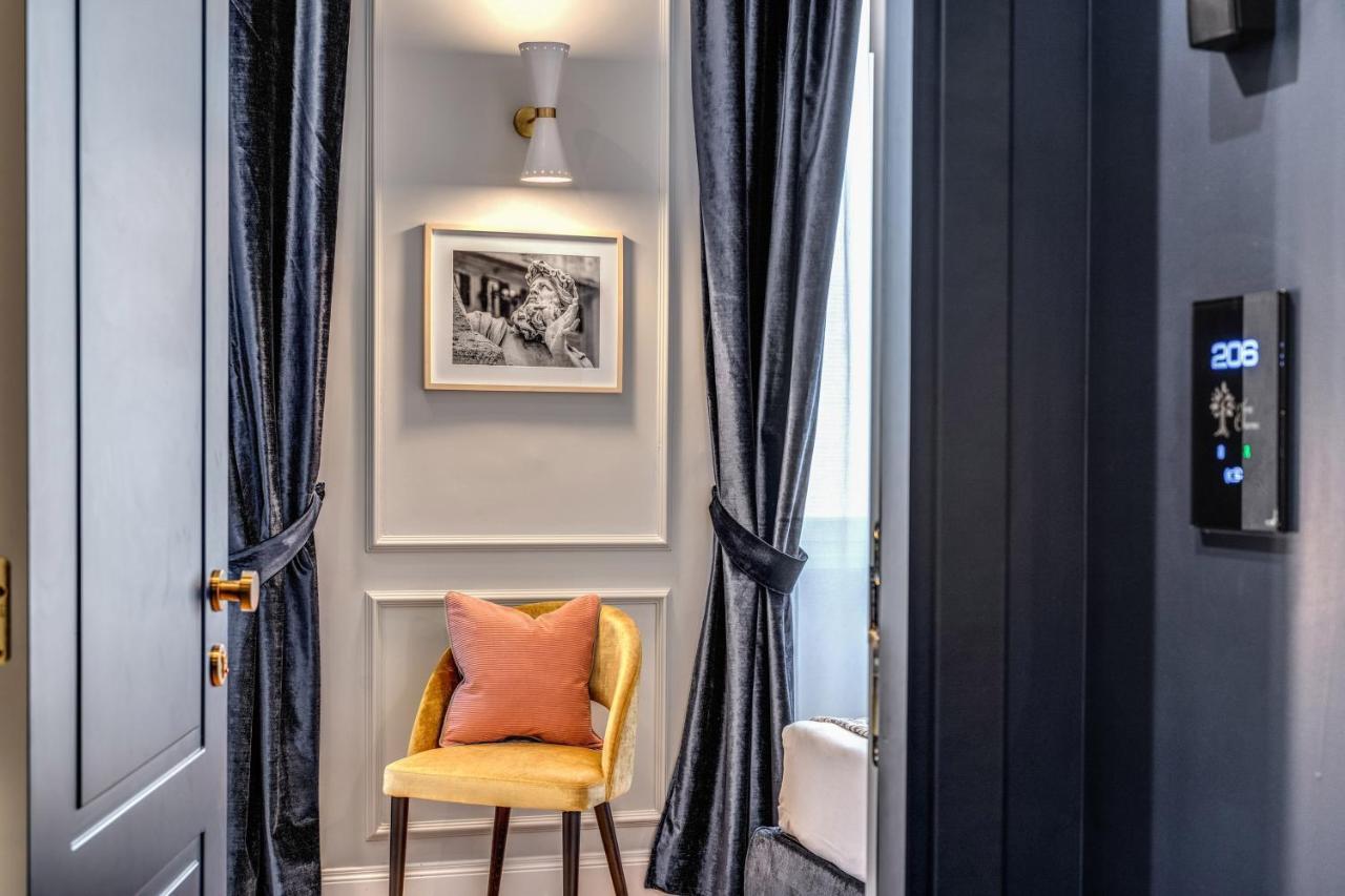 Tree Charme Augusto Luxury Suites โรม ภายนอก รูปภาพ